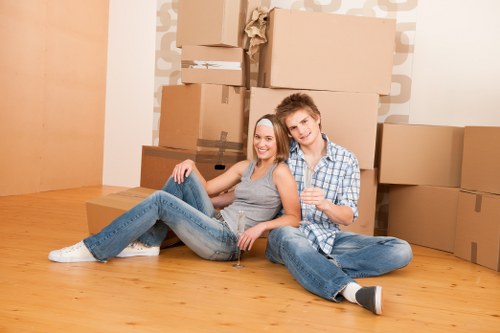 Flat removals in Finsbury with a moving team preparing boxes and furniture