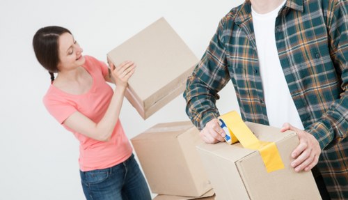 Moving van and packed boxes for removals in Finsbury