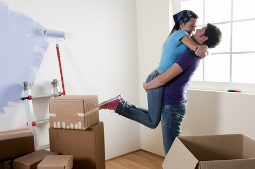 Local packing team organizing boxes for a move in Finsbury
