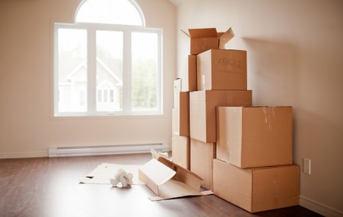 Careful packing for flat removals in Finsbury with labelled moving boxes