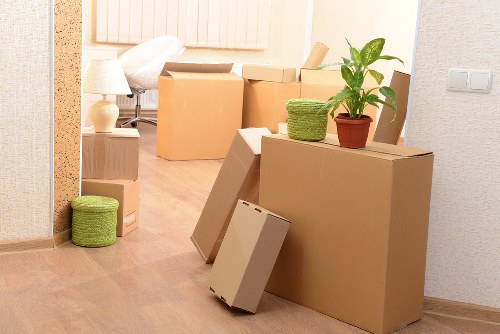 Moving boxes and furniture prepared for secure storage