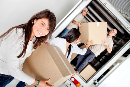 Professional movers handling furniture during a Finsbury relocation
