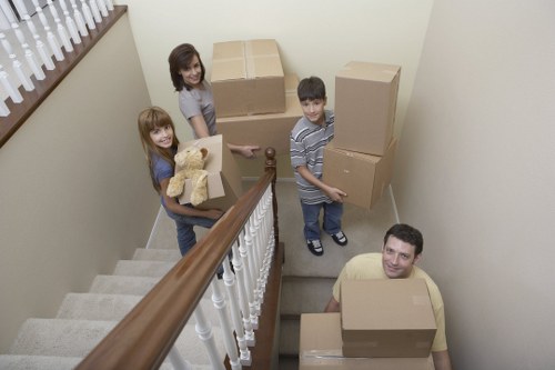 Manual handling safety with a storage trolley and stacked goods